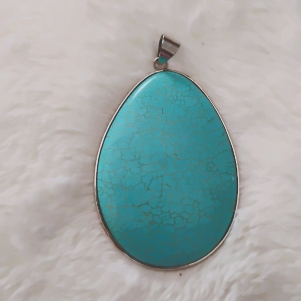 Natural turquoise and sterling silver pendant